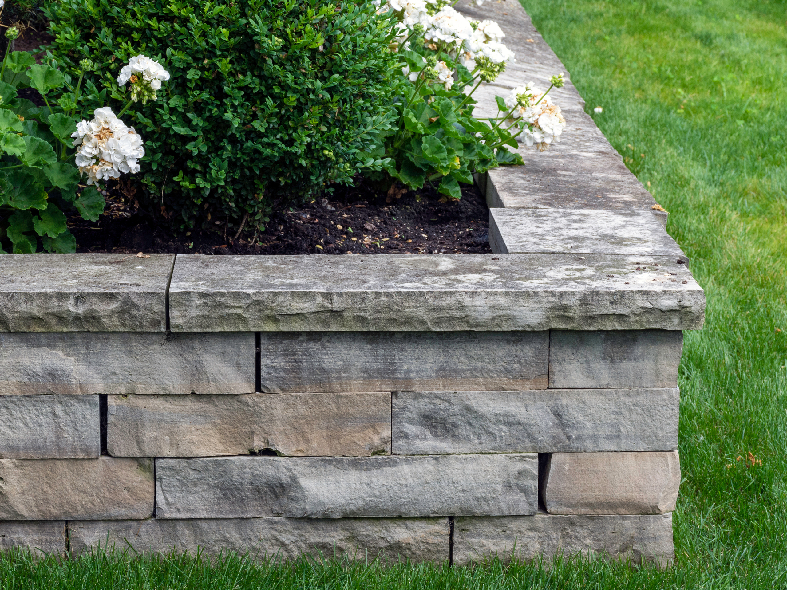 retaining wall Compacted aggregate base and first course for retaining wall — Kenosha