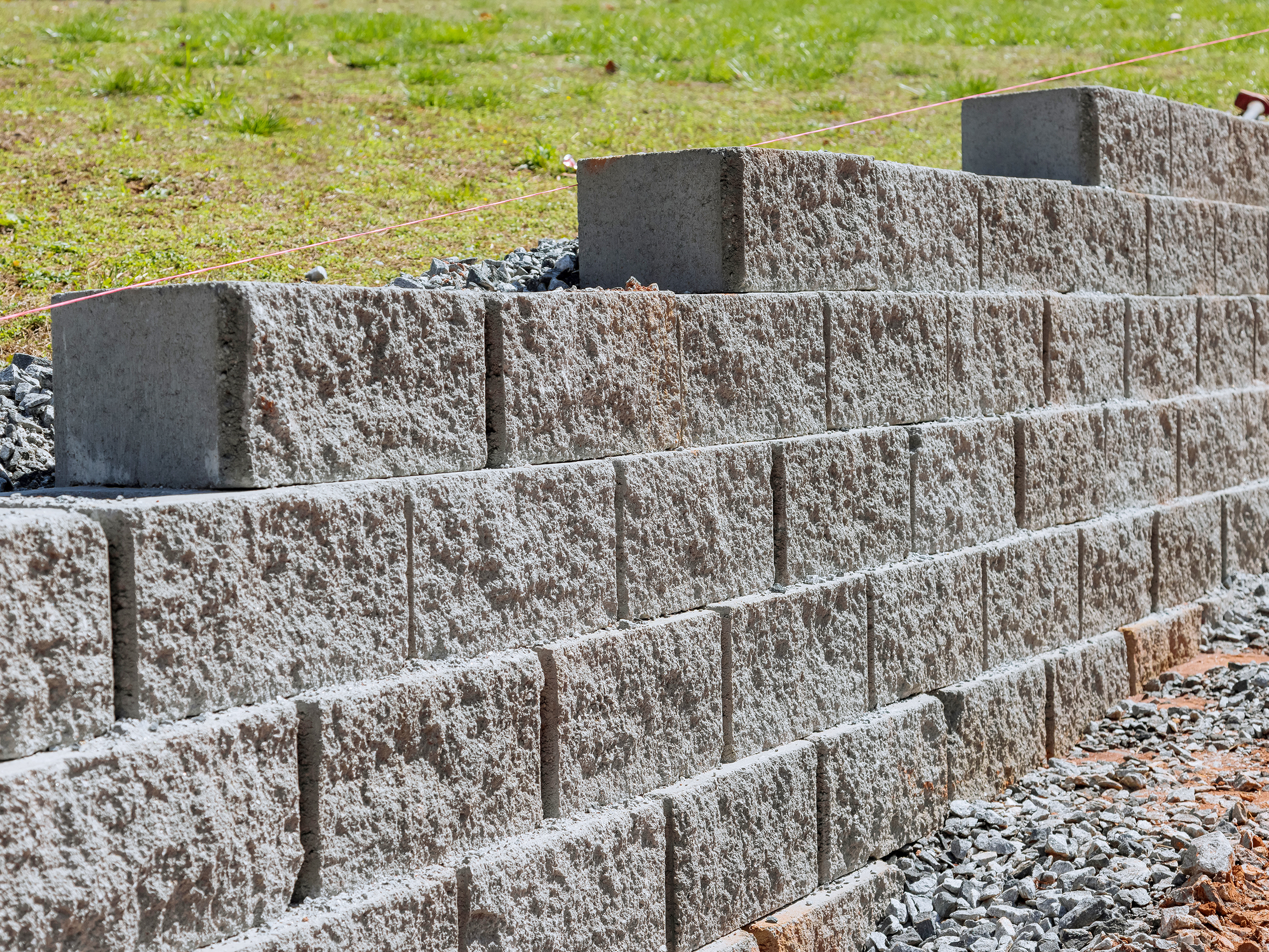 retaining walls Segmental block retaining wall with cap installed in Kenosha, WI